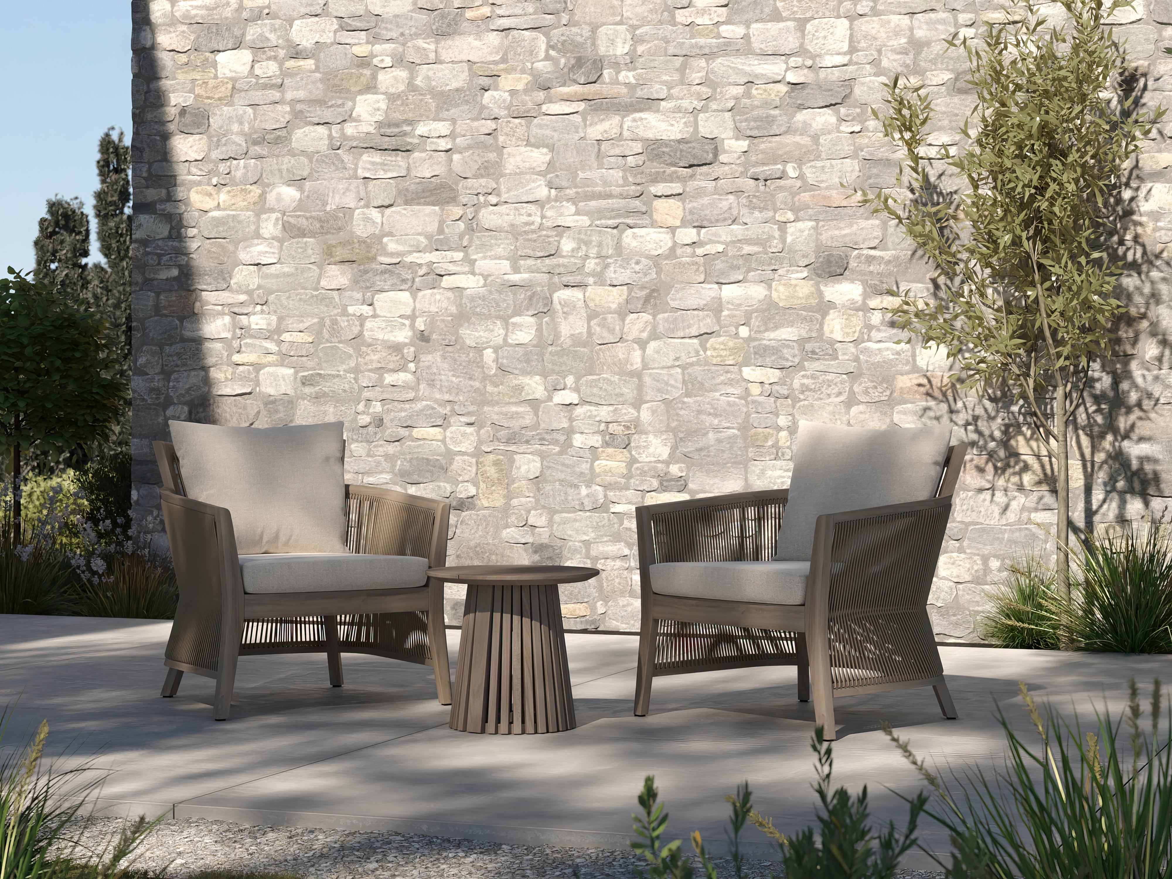 A teak lounge setting by a pool