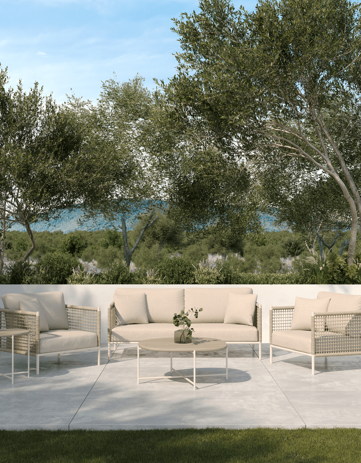 Cottesloe Sofas, Lounge Chair and Coffee Table on a concrete terrace among olive trees