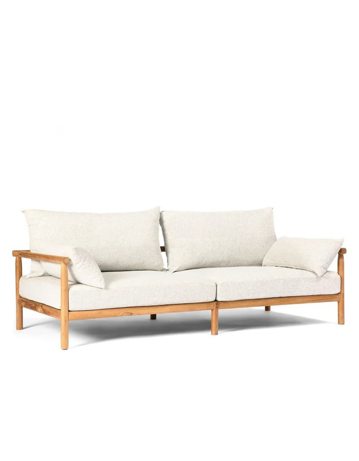 Jan Juc Sofa in teak with ivory cushions, angled view