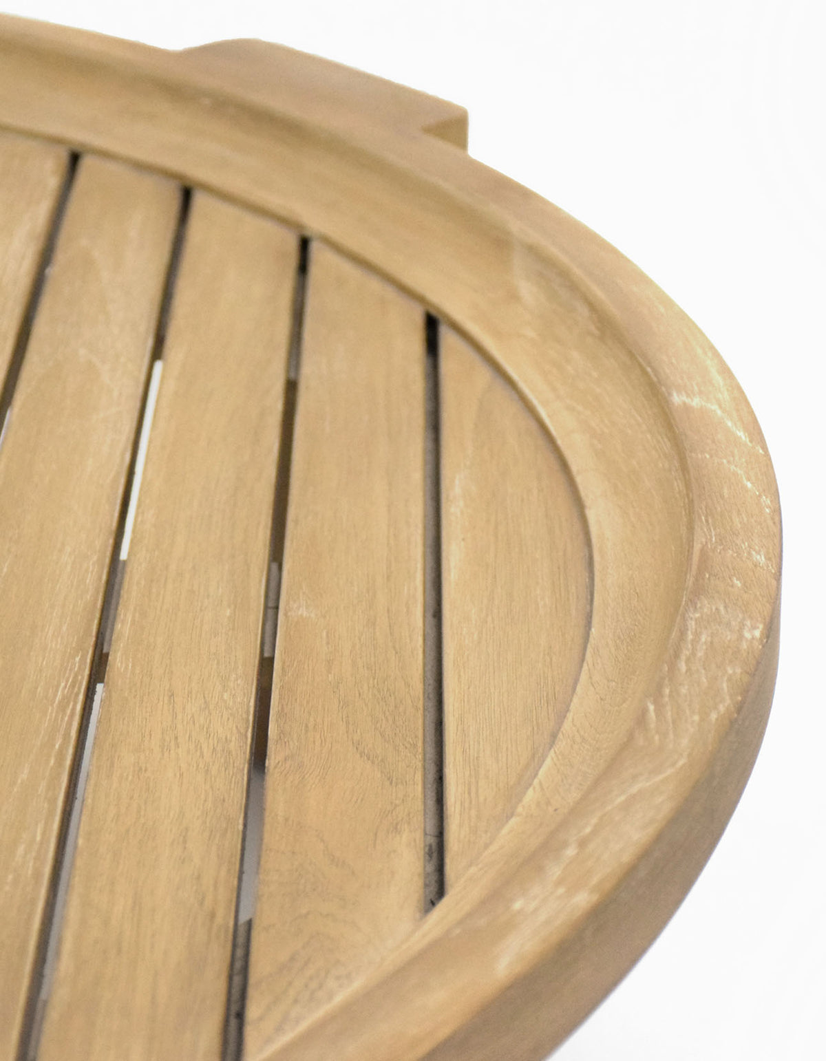 Wategos Coffee Table in natural teak, close-up of the slatted top and raised rim