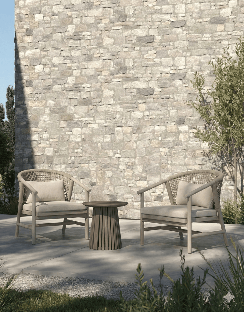 The Sissonne Outdoor Shelley lounge chairs by a pool