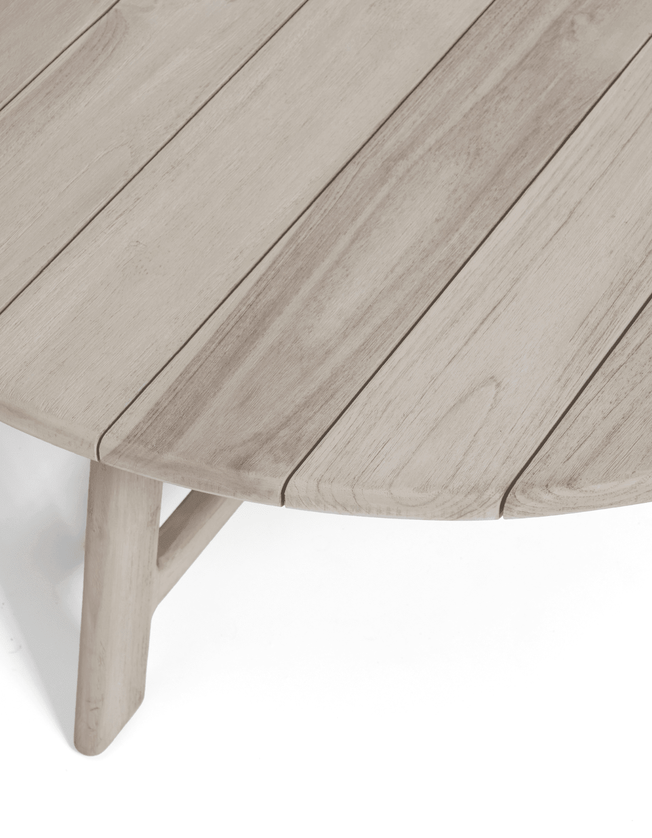 A close up shot of a solid teak table top