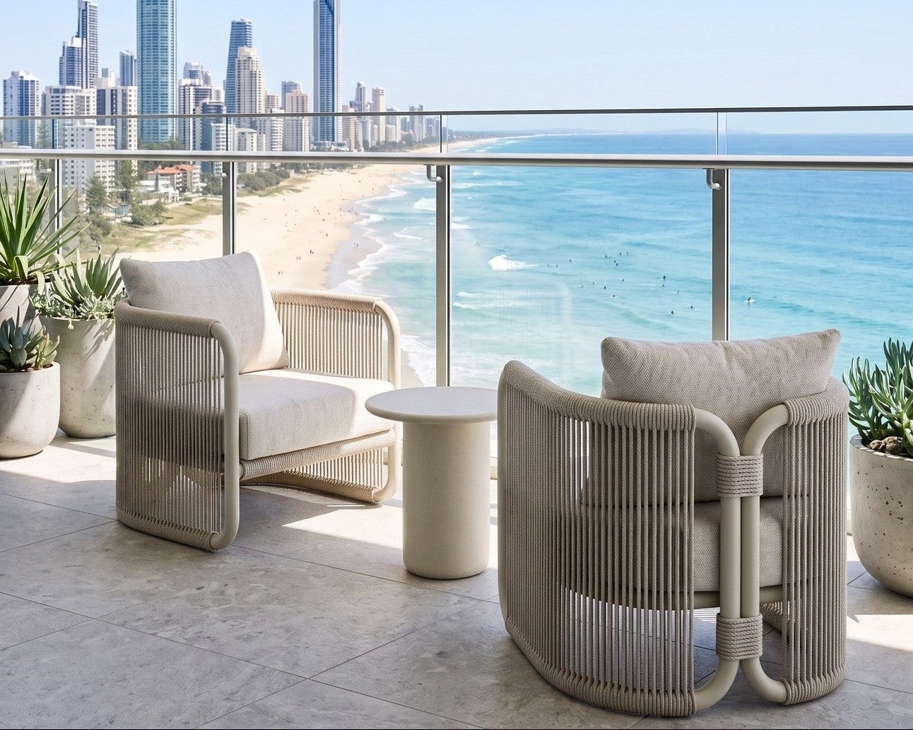 Outdoor seating area with a view of a city skyline and ocean.